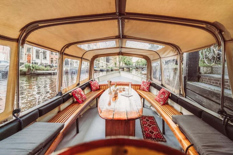 Amsterdam: Private Romantic Canal Cruise w. Prosecco/Snacks - Learning what life on the water is really like