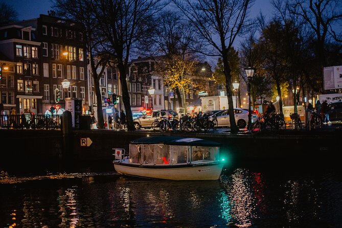 Amsterdam: Private Romantic Evening Canal Cruise + Bubbles/Snacks - Entering Amsterdam’s night at Herengracht 605