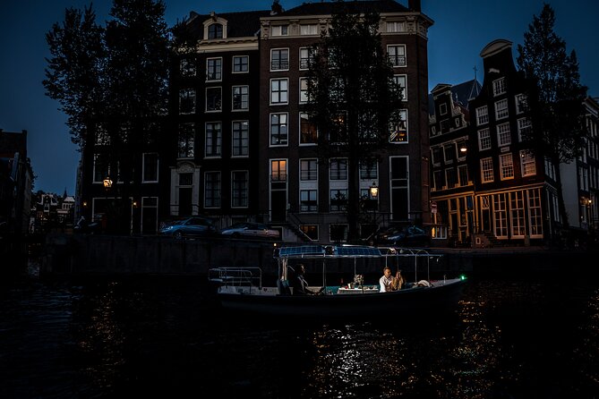 Amsterdam: Private Romantic Evening Canal Cruise + Bubbles/Snacks - Love-and-romance storytelling tied to real landmarks
