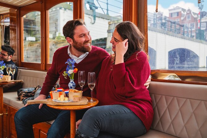 Amsterdam: Romantic Canal Cruise with Optional Bubbles & Bites - Cultural Landmarks: Opera, Protestant Churches, and Theatres in One Hour