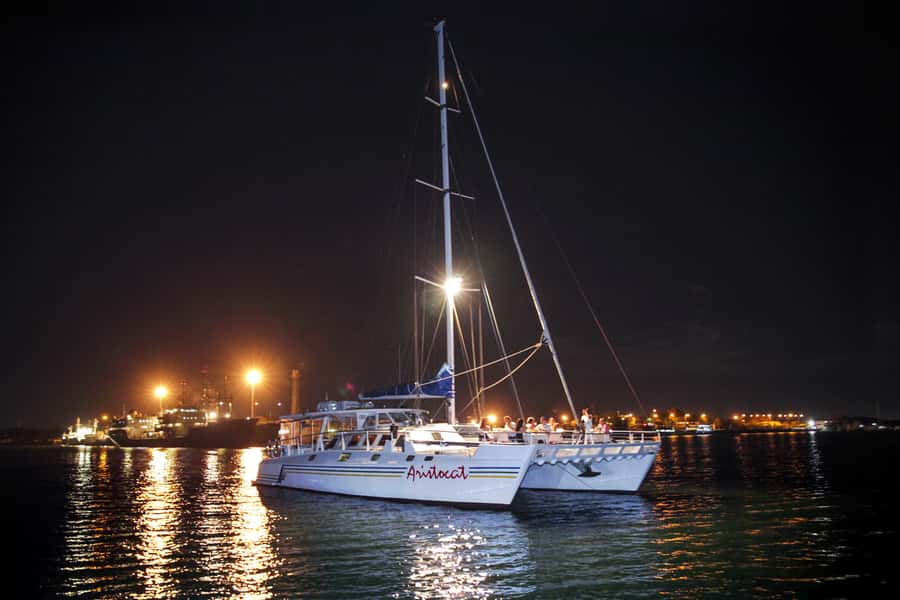 Bali/Benoa: 5-Course Romantic Evening Cruise With Live Music - The catamaran experience: calm water, twinkling lights, and sea air