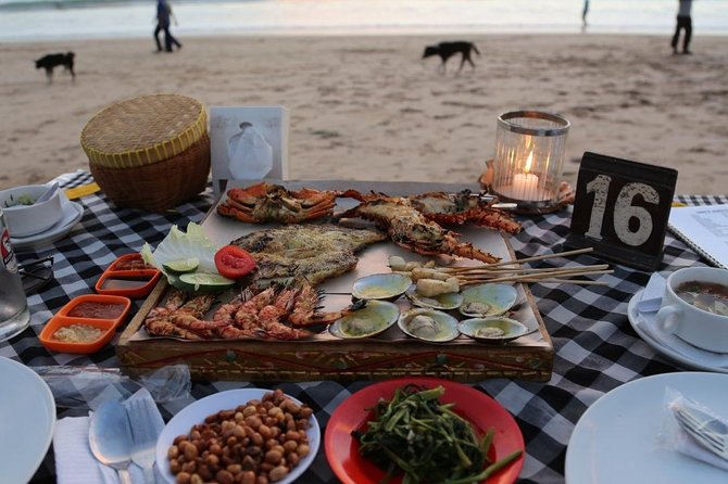 Best Romantic Seafood Dinner at Jimbaran Beach Sunset - The seafood feast: fish, prawns, squid, crab, and lobster (with sambal)