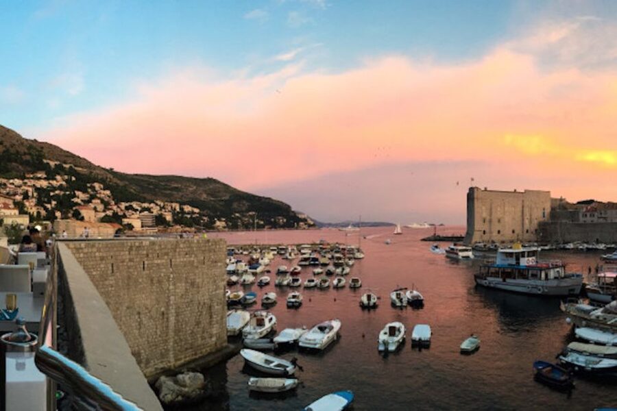 Dubrovnik: Romantic Sunset Cruise & Cave Visit with a Local - Open-air deck reality check: what to bring for comfort