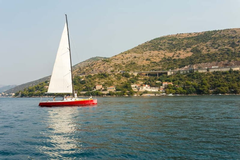 Dubrovnik: Romantic Sunset Sailing Adventure - Old Town from the water: walls, domes, and red roofs in a new frame
