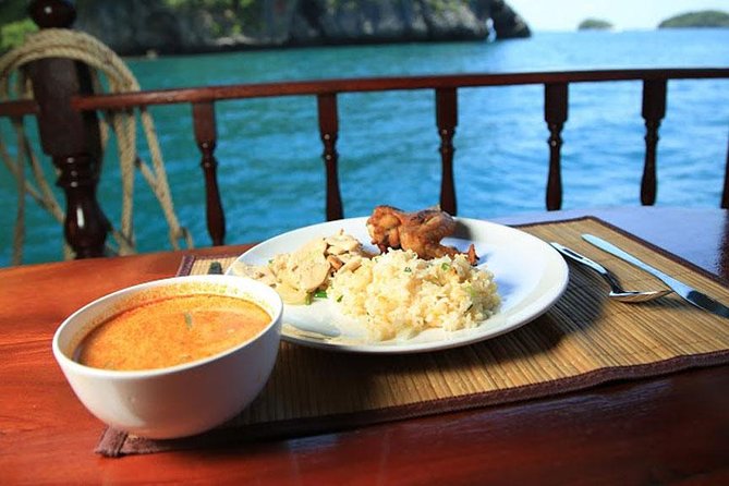 Krabi Romantic Sunset Cruise with BBQ Seafood Dinner by Krabi Sea Cruise - Phra Nang Cave: sunset, fishing on the boat, and plankton glow
