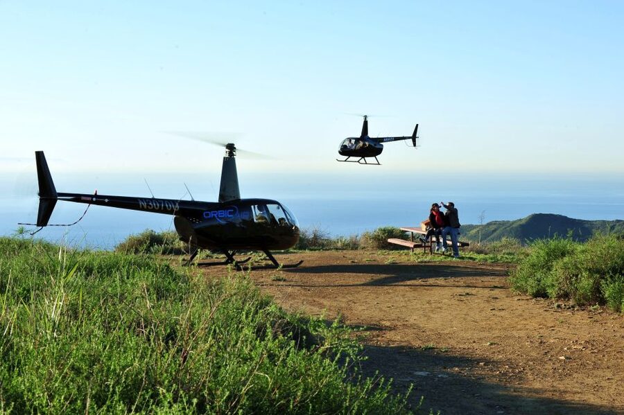 Los Angeles Helicopter Tour & Malibu Mountaintop Landing - The coast flyover: Marina del Rey to Venice and Santa Monica Pier