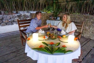 Romantic Private Sunset and Motu Dinner for Two - The Beach Dinner Setup: Torches, Ukulele Music, and a Table for Two