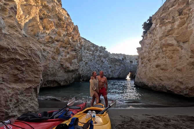 Romantic Sunset Kayaking Tour in Papafragas Cave, Milos - Fylakopi shore pass and the half-submerged archaeological site: swim with context