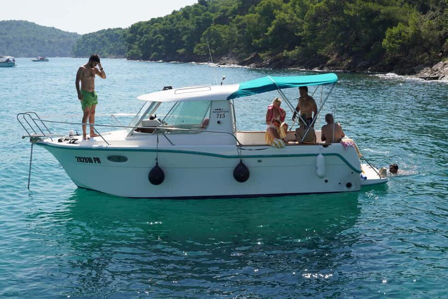 Romantic Zadar Sunset and Night Coctails Cruise - Meeting near a gas station, then settling onto a small boat