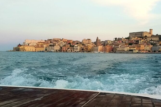 Sunset Romantic Escape with Aperitif - Sailing past medieval Gaeta as evening lights up