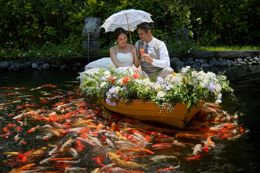 Ubud: Private Romantic Photo Cruise with Food and Drinks - Koi fish feeding on the pond: the moment that makes it feel real
