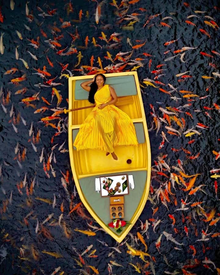 Ubud: The Original Koi Fish Yellow Boat Photo Moment - Key moments worth booking